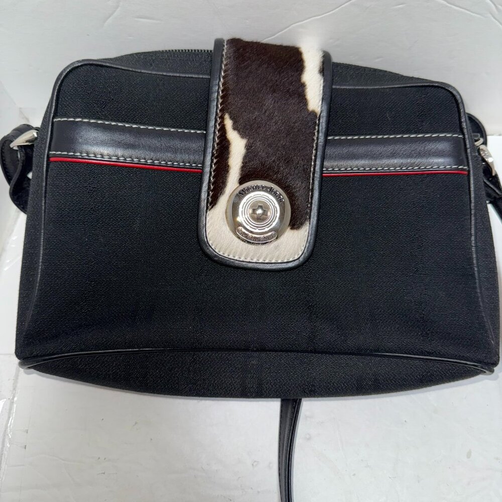 Michel Jordi Purse with Cow Hide Details